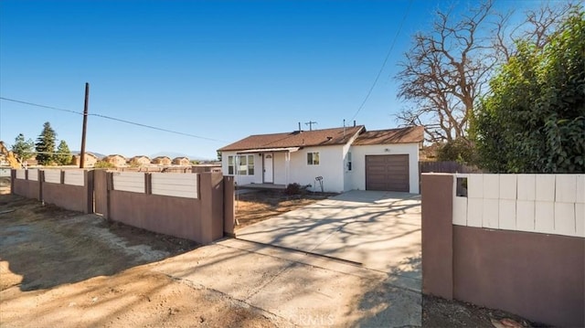 view of property exterior with a garage