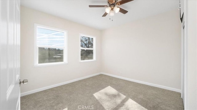 unfurnished bedroom featuring ceiling fan and light colored carpet