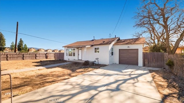 single story home with a garage