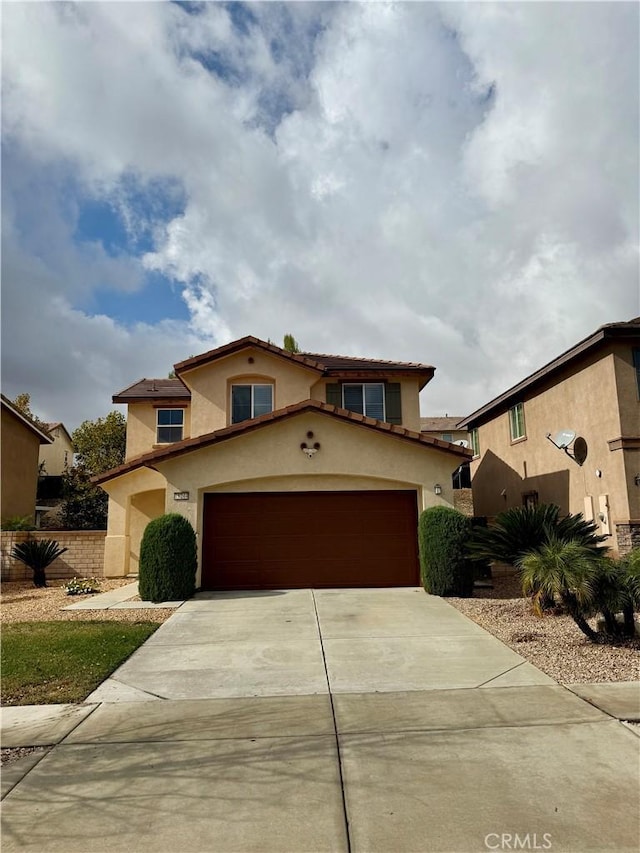 view of front of property with a garage