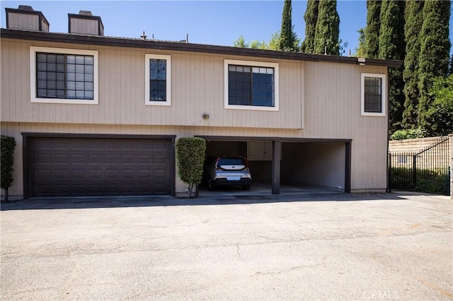 view of front of property with a garage