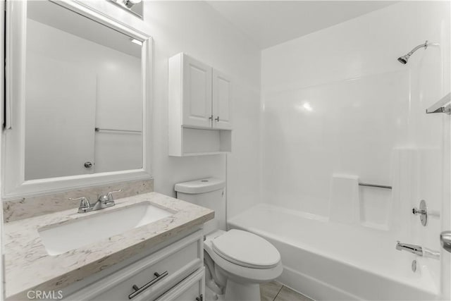 full bathroom with toilet, vanity, tile patterned flooring, and bathing tub / shower combination