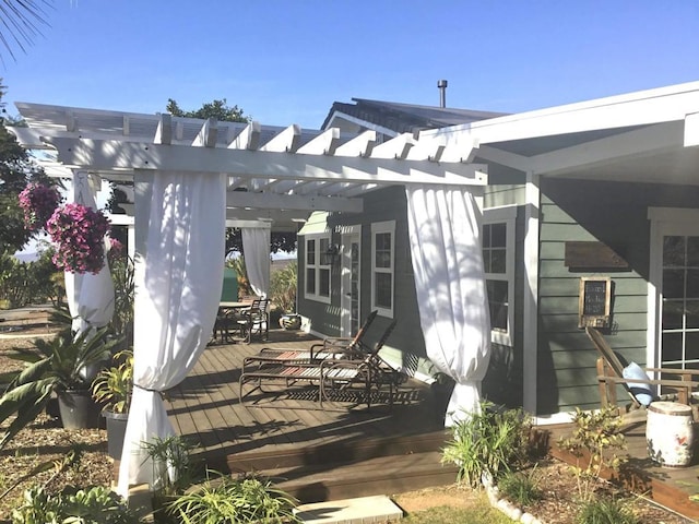 view of patio / terrace with a pergola and a deck