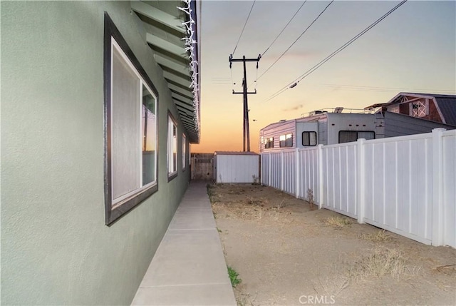 view of property exterior at dusk