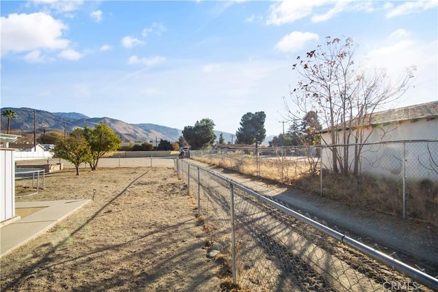 view of street featuring a mountain view and a rural view