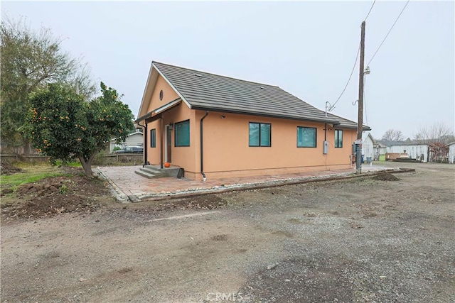 view of home's exterior featuring a patio