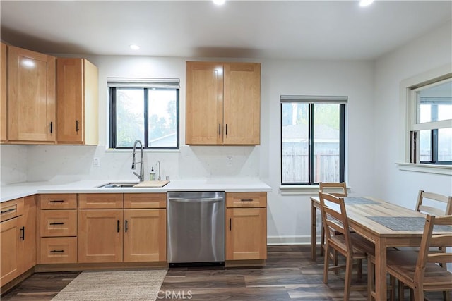 kitchen with backsplash, dark hardwood / wood-style flooring, light brown cabinetry, dishwasher, and sink