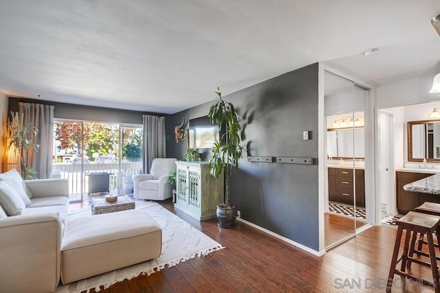 living room with hardwood / wood-style flooring