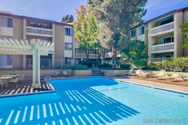 view of pool with a pergola