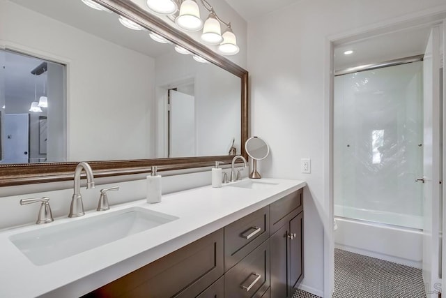 bathroom with tile patterned floors, combined bath / shower with glass door, and vanity