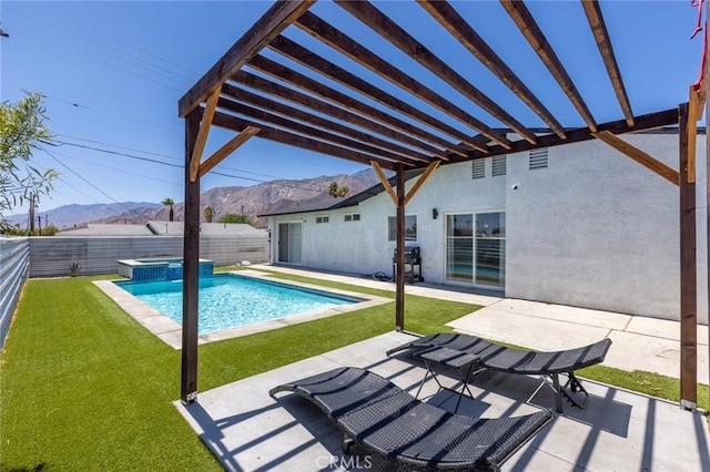 view of swimming pool with a pergola, a patio area, a mountain view, and a yard