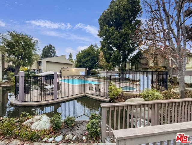 view of pool featuring a patio