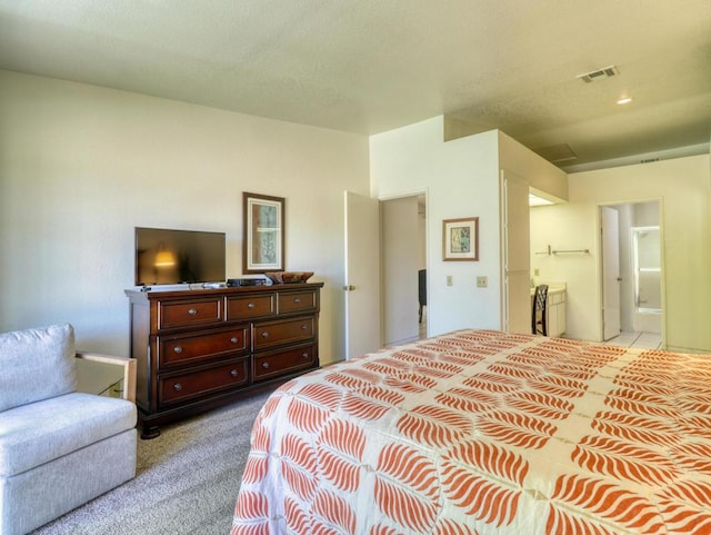 bedroom featuring light carpet