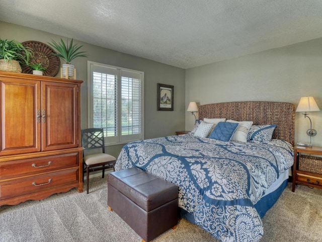 carpeted bedroom with a textured ceiling