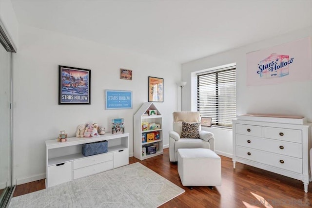 living area with dark wood-type flooring