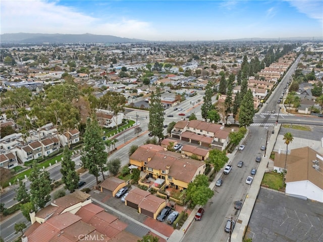 drone / aerial view featuring a mountain view