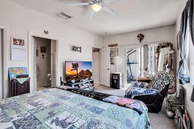 bedroom featuring ceiling fan and light colored carpet