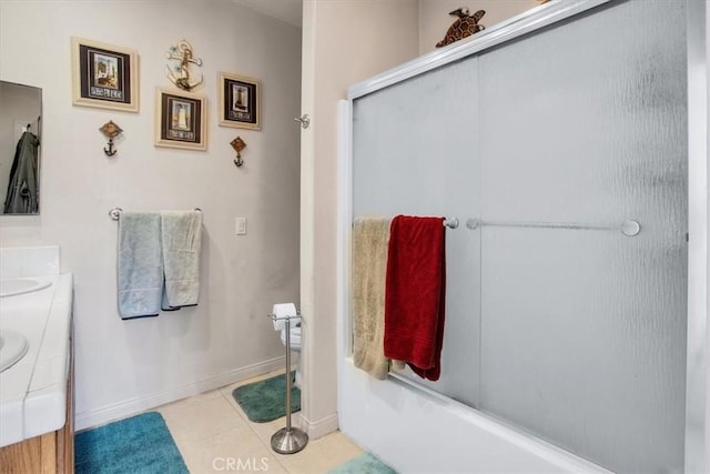 bathroom with vanity and tile patterned flooring