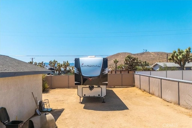 view of yard with a mountain view