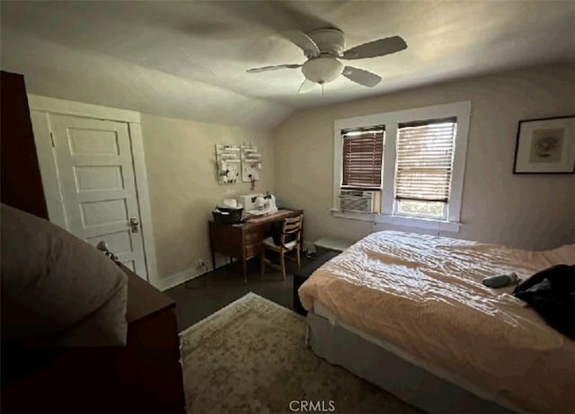 bedroom featuring ceiling fan and vaulted ceiling