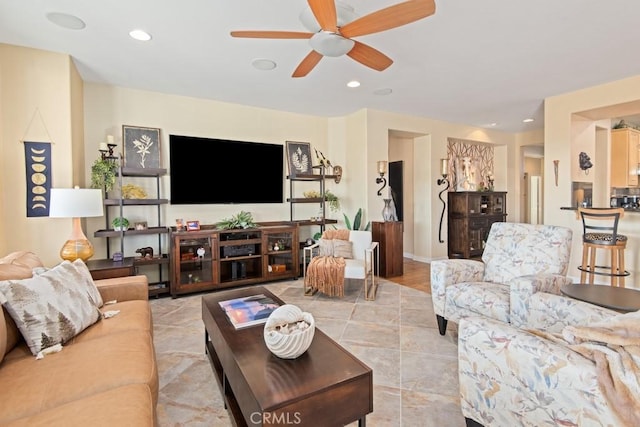 living room with ceiling fan