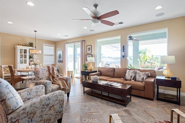 living room featuring ceiling fan