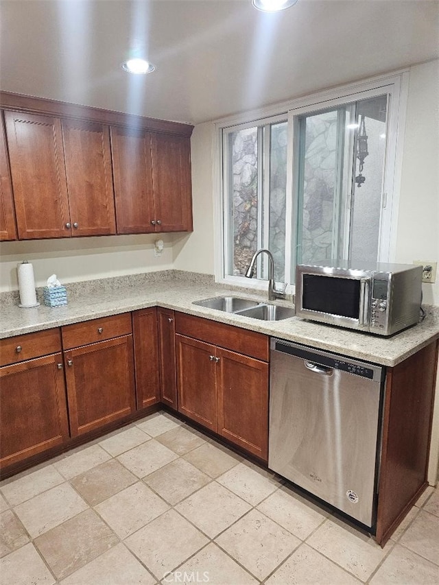 kitchen featuring appliances with stainless steel finishes and sink