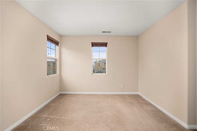 unfurnished room with carpet