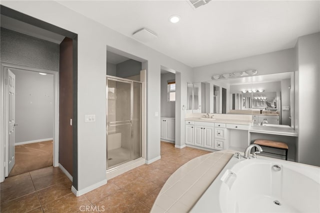 bathroom with vanity, tile patterned flooring, and independent shower and bath