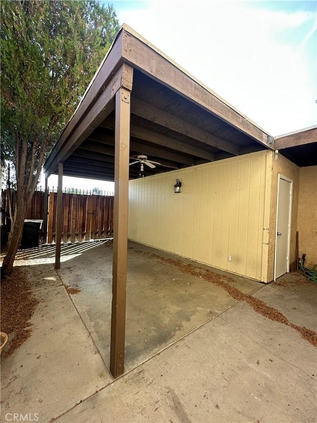 view of parking with ceiling fan