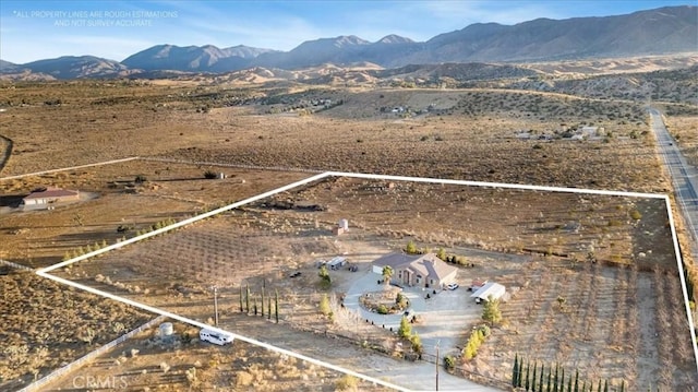 bird's eye view with a mountain view