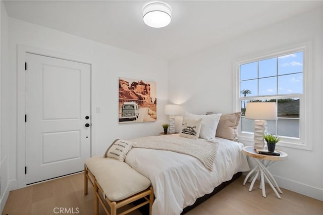 bedroom featuring light wood-type flooring