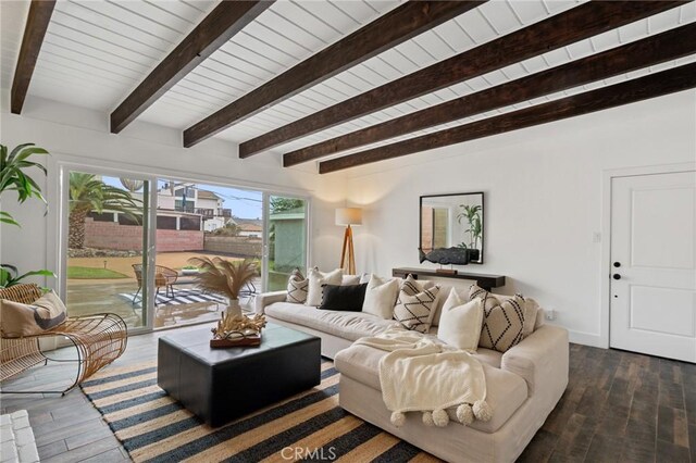 living room with beamed ceiling