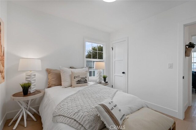 bedroom featuring light hardwood / wood-style floors