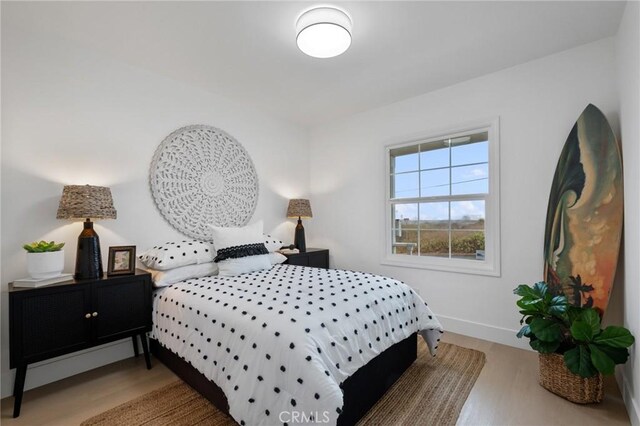 bedroom featuring hardwood / wood-style floors