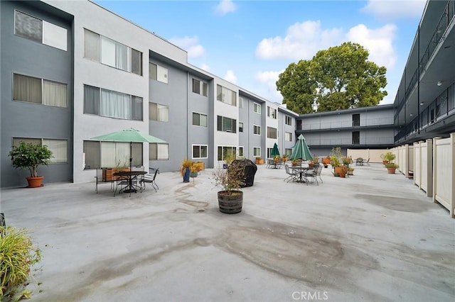 view of home's community featuring a patio area