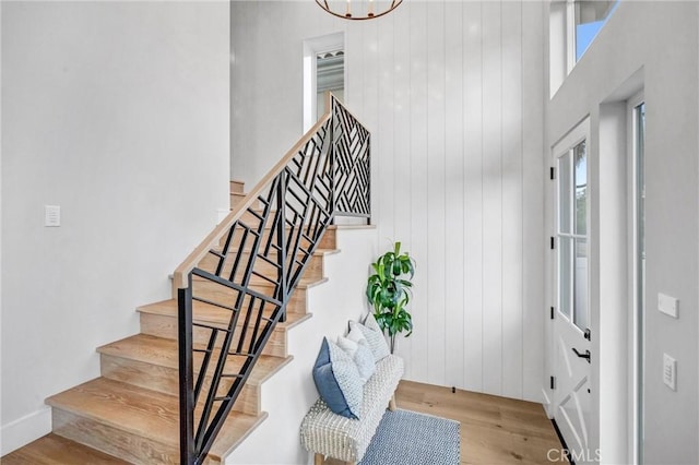 staircase featuring hardwood / wood-style flooring