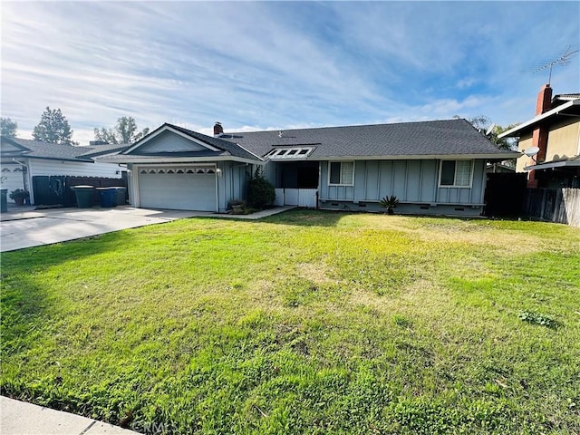 ranch-style house with a garage and a front lawn