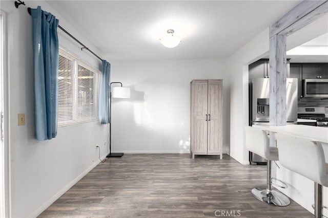 unfurnished office featuring dark hardwood / wood-style flooring