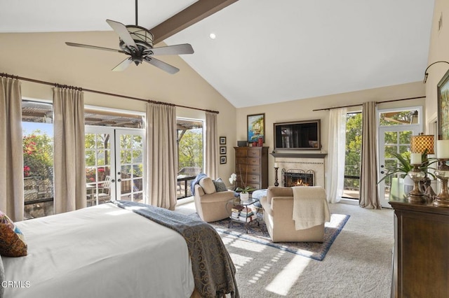 bedroom featuring light carpet, ceiling fan, access to exterior, and multiple windows