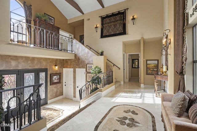 entryway featuring a high ceiling