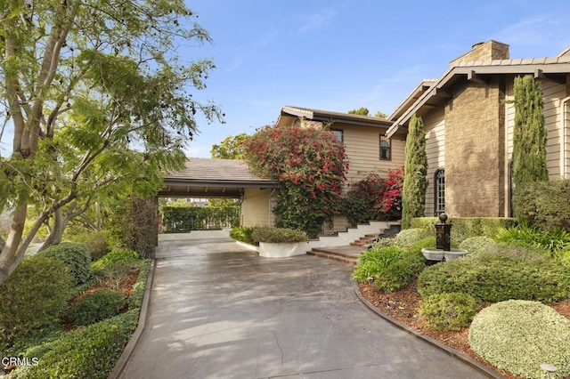 view of front of house featuring a carport