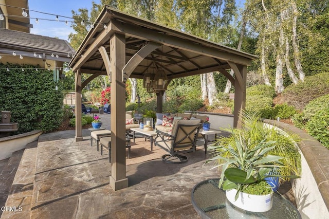 view of patio with a gazebo and outdoor lounge area