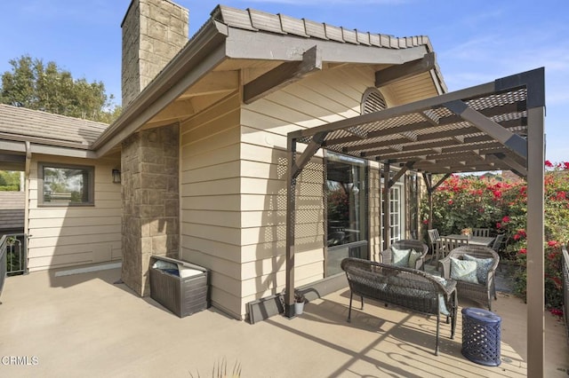 view of patio / terrace with outdoor lounge area and a pergola