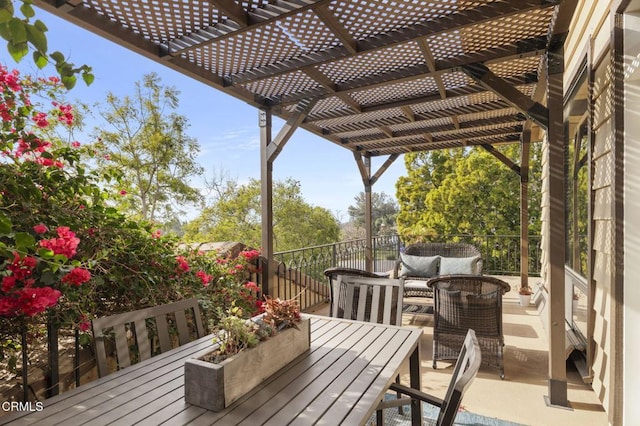 wooden deck with a pergola and outdoor lounge area