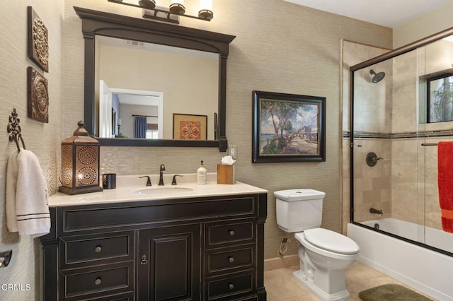full bath with toilet, visible vents, tile patterned flooring, combined bath / shower with glass door, and vanity
