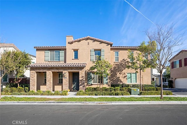 16457 Globetrotter Ave, Chino, CA 91708 - mediterranean / spanish home featuring a garage