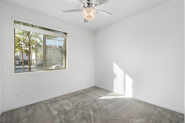 unfurnished room with carpet floors and ceiling fan