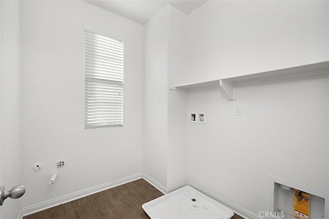 laundry room with dark wood-type flooring, washer hookup, and hookup for a gas dryer