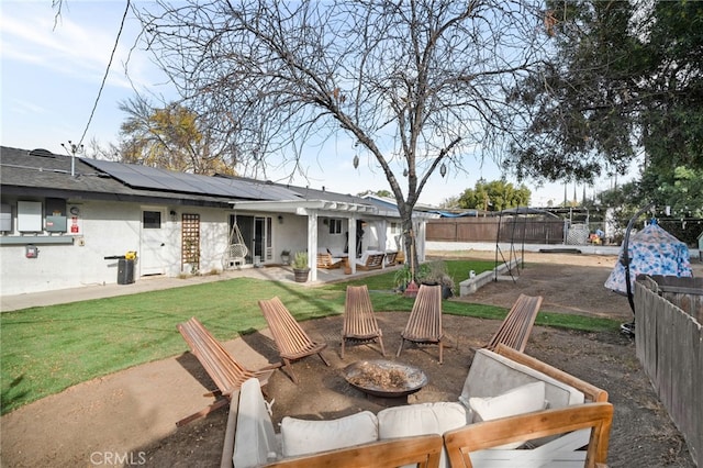 view of patio / terrace with a fire pit